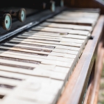 Old Piano out at Luck Reunion shot by Maggie boyd